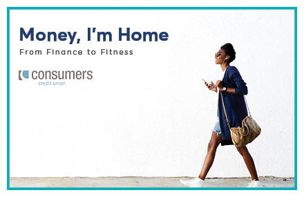 A woman wearing sunglasses walking with bag on shoulder and phone in hand in front of a white wall with a Consumers Credit Union logo