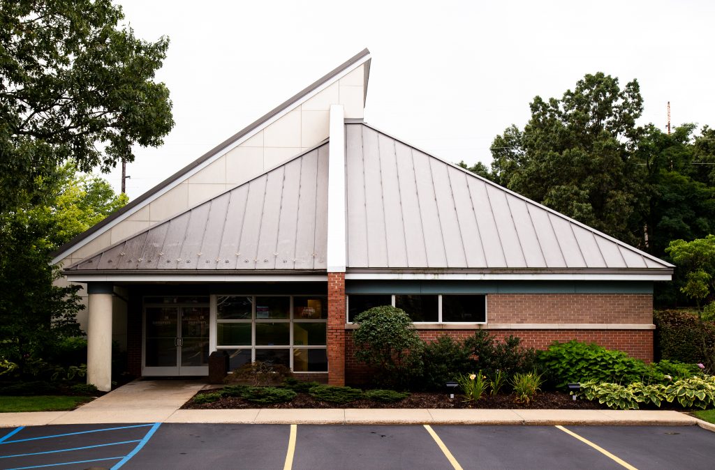 A Consumers Credit Union office with a slanted roof