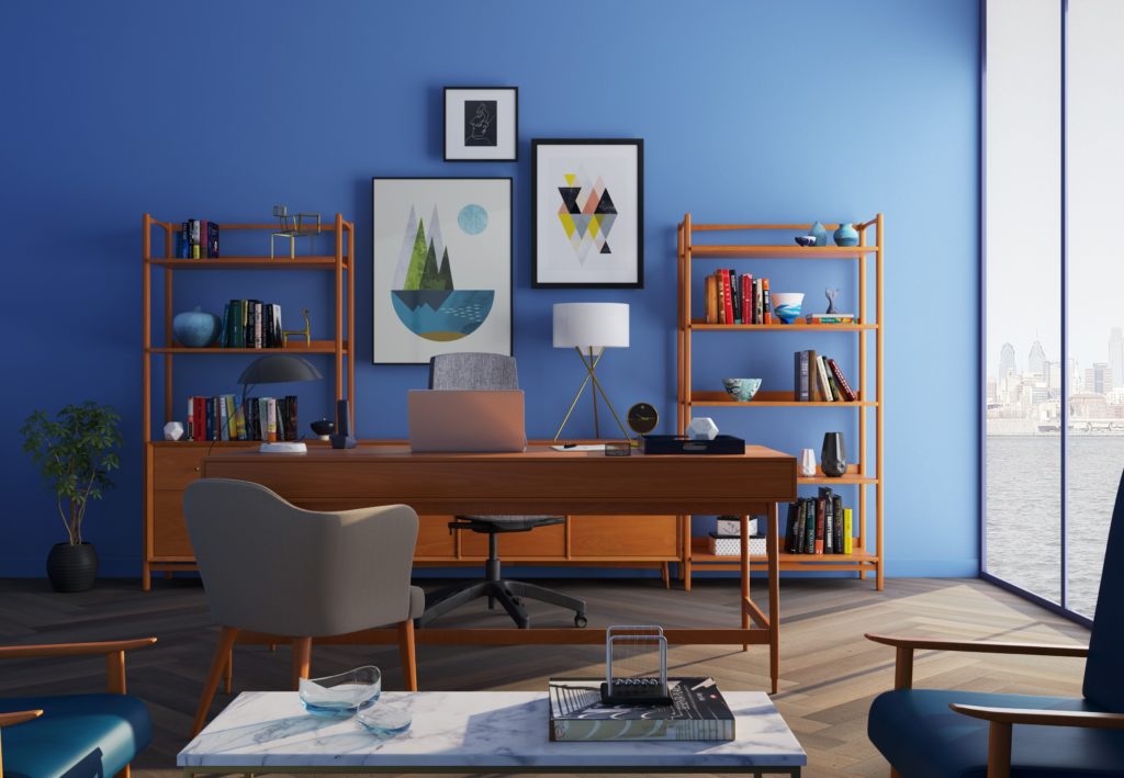 An executive office setting with a bright blue wall.