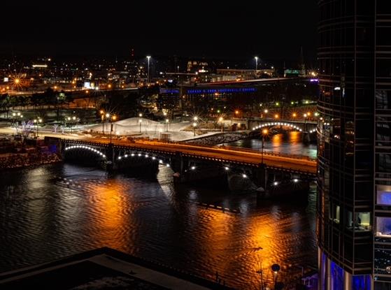 A bridge in downtown Grand Rapids at night.