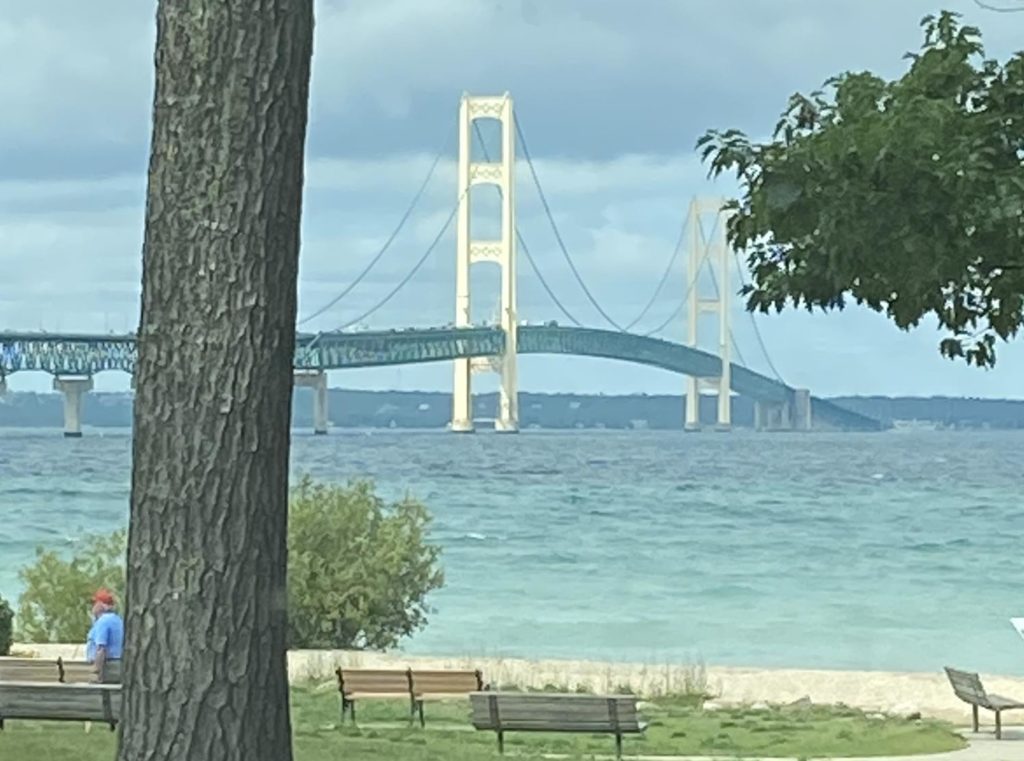 Mackinac Bridge in Northern Michigan on a partly cloudy day.