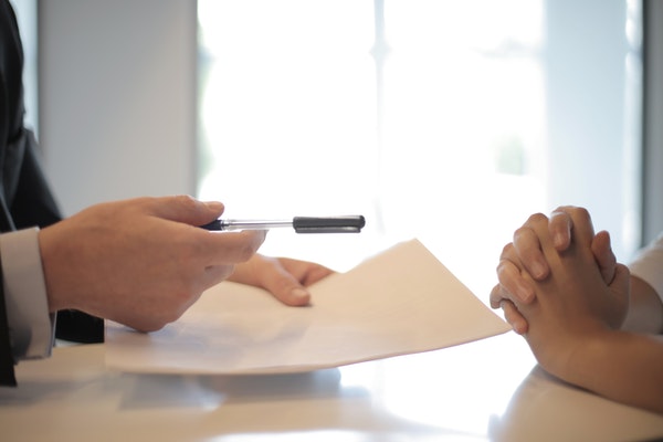 Person signing a loan document