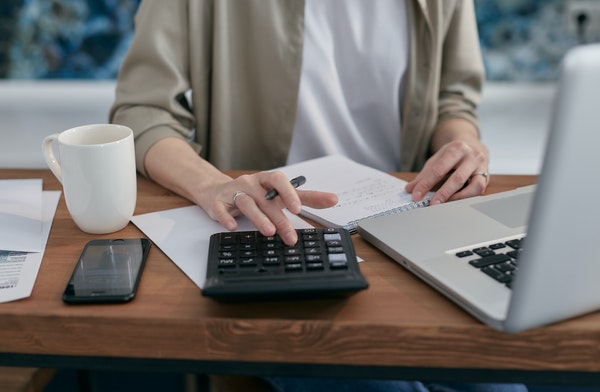 Woman working at desk on budgeting