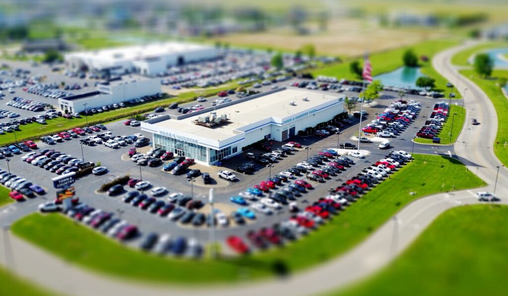 Aerial view of a vehicle dealership lot.