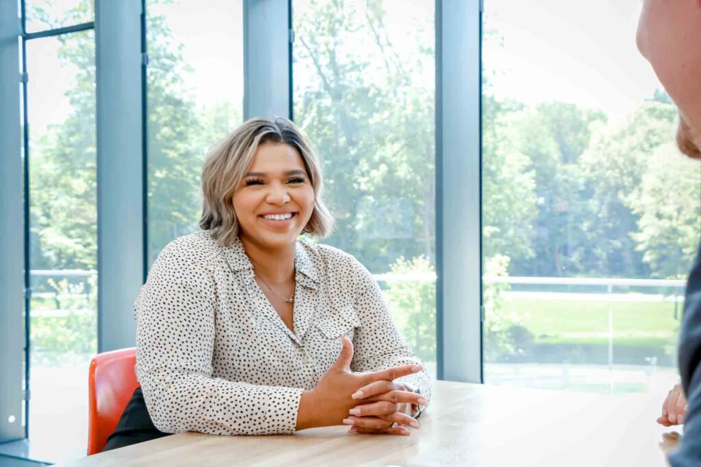 Consumers Mortgage Loan Officer Vanna Stevens smiles from across the table as she chats with a member.