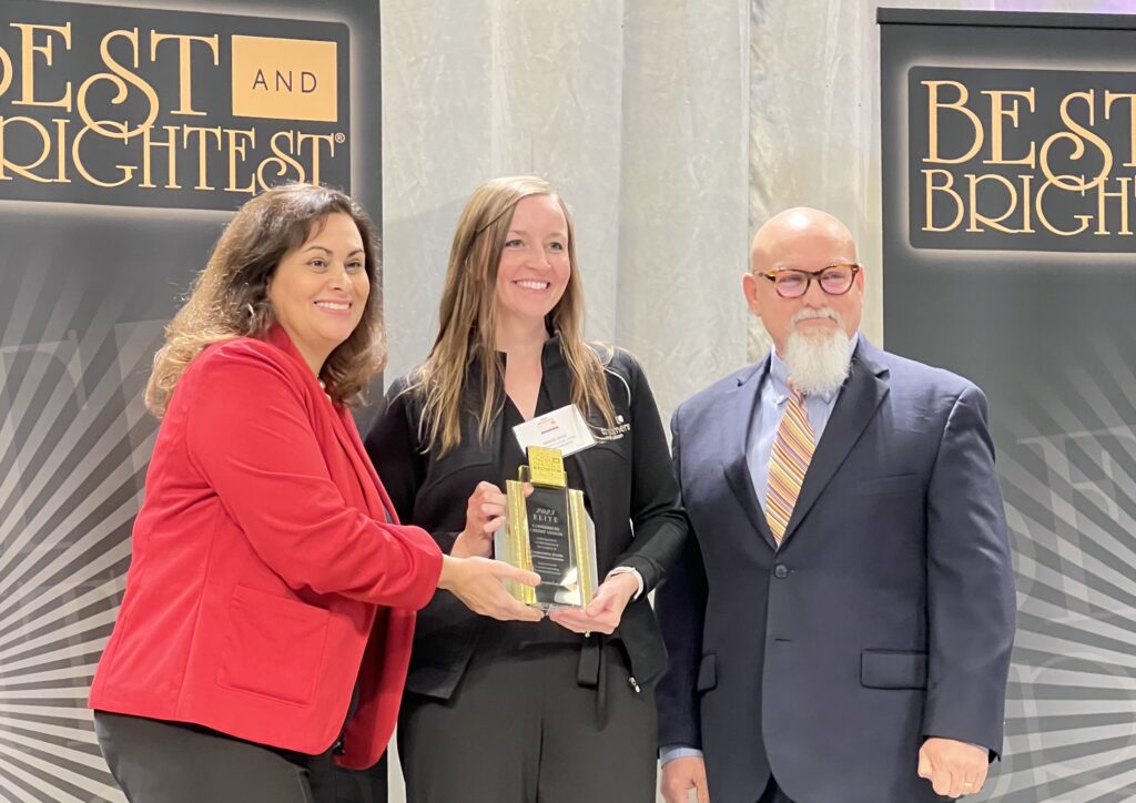 Consumers' Jennifer Smith accepts the 2023 Best and Brightest Elite Award for Compensation, Benefits and Employee Solutions.