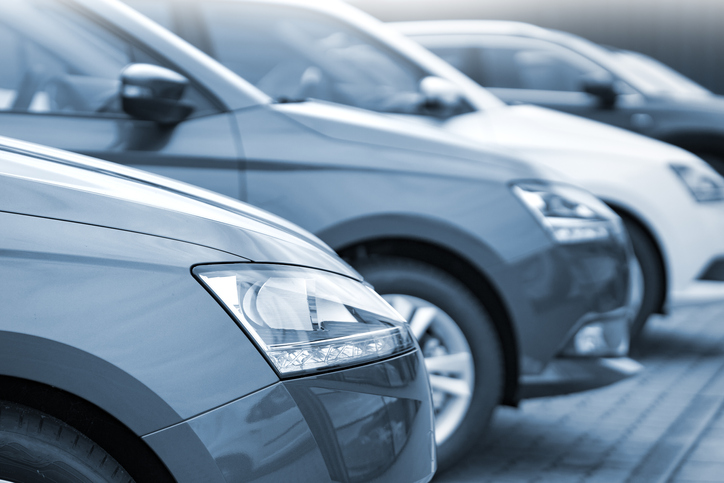 Four vehicles lined up in a row.