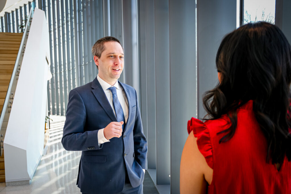 Joshua Ruggles speaking with a client