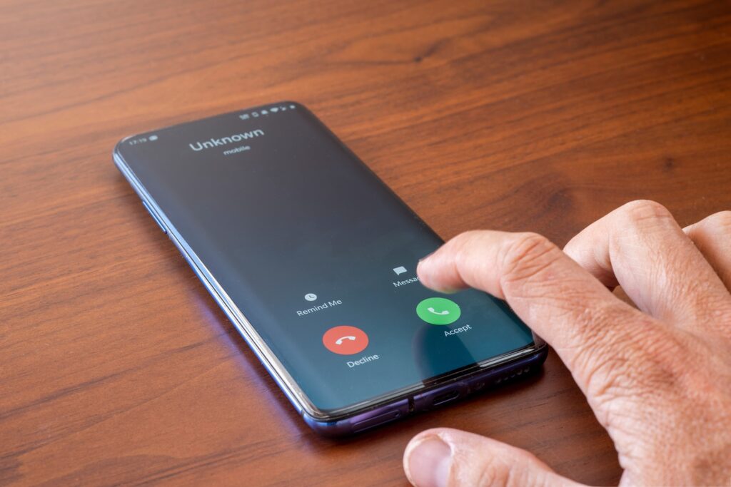 Phone call with an "Unknown" caller designation on it.