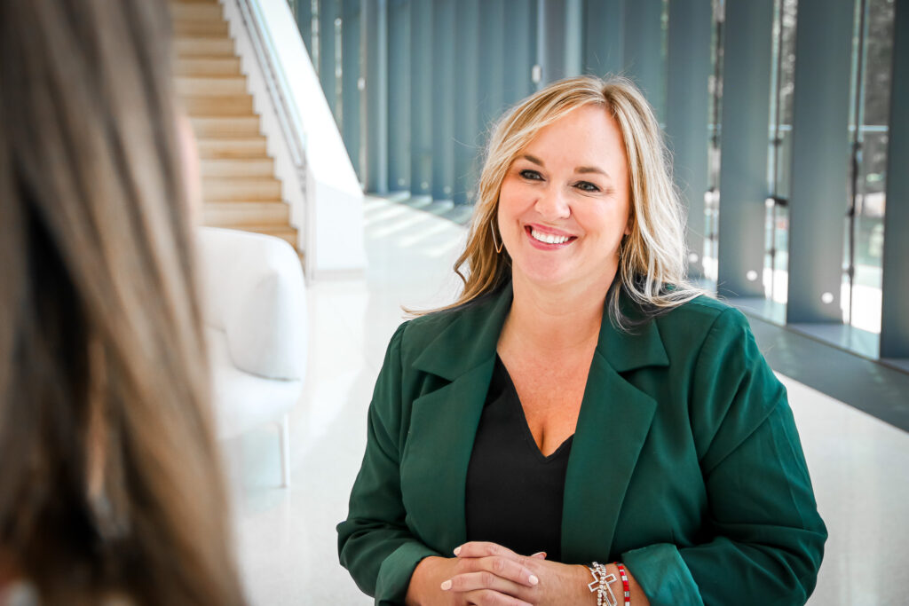 Mortgage Loan Officer Erin Smith talks with another person