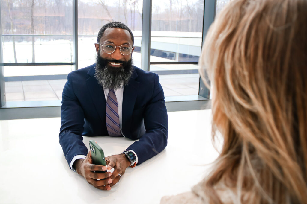 Mortgage Loan Officer Everett Hurt talks with another person